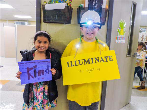 Students and teachers dressing up for a vocabulary parade. 